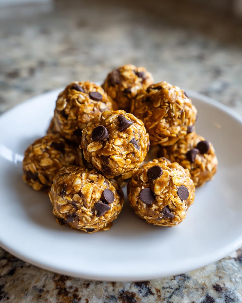 Plate of no bake snack bites made with oats and chocolate chips close-up